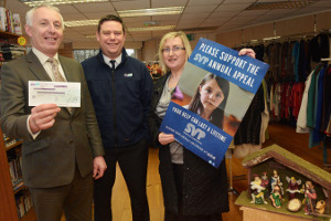 l/r Ian Barry of Flogas Ireland presents a €500 cheque in aid of St. Vincent de Paul’s annual Christmas Appeal to Gerry Garvey, south-west regional administrator and Anne McKernan, fundraising co-ordinator at their shop in Douglas, Cork.